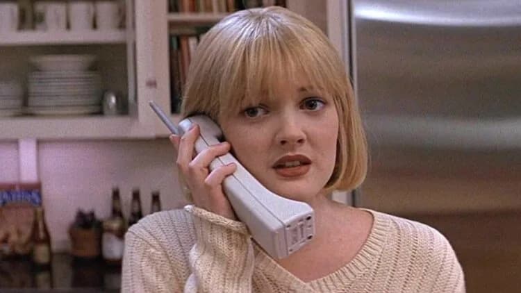 Contact image of Drew Barrymore on the phone from the opening scene of the original Scream movie